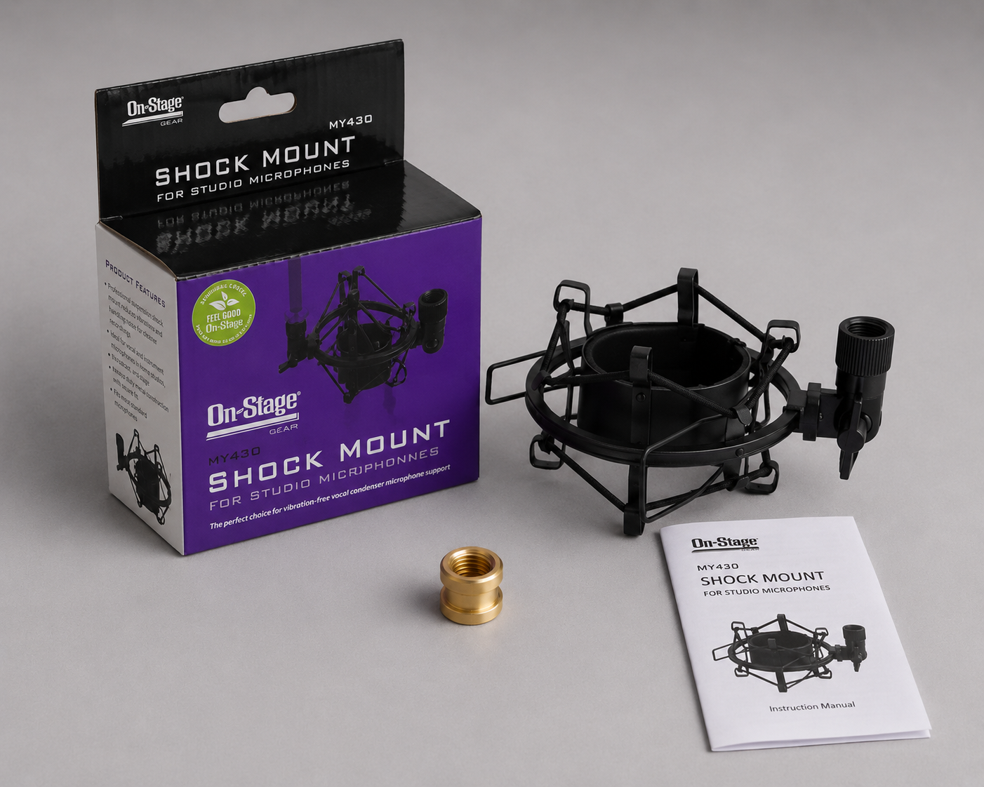 Unboxed On-Stage MY-430 microphone shock mount shown next to its original product packaging box and user manual.