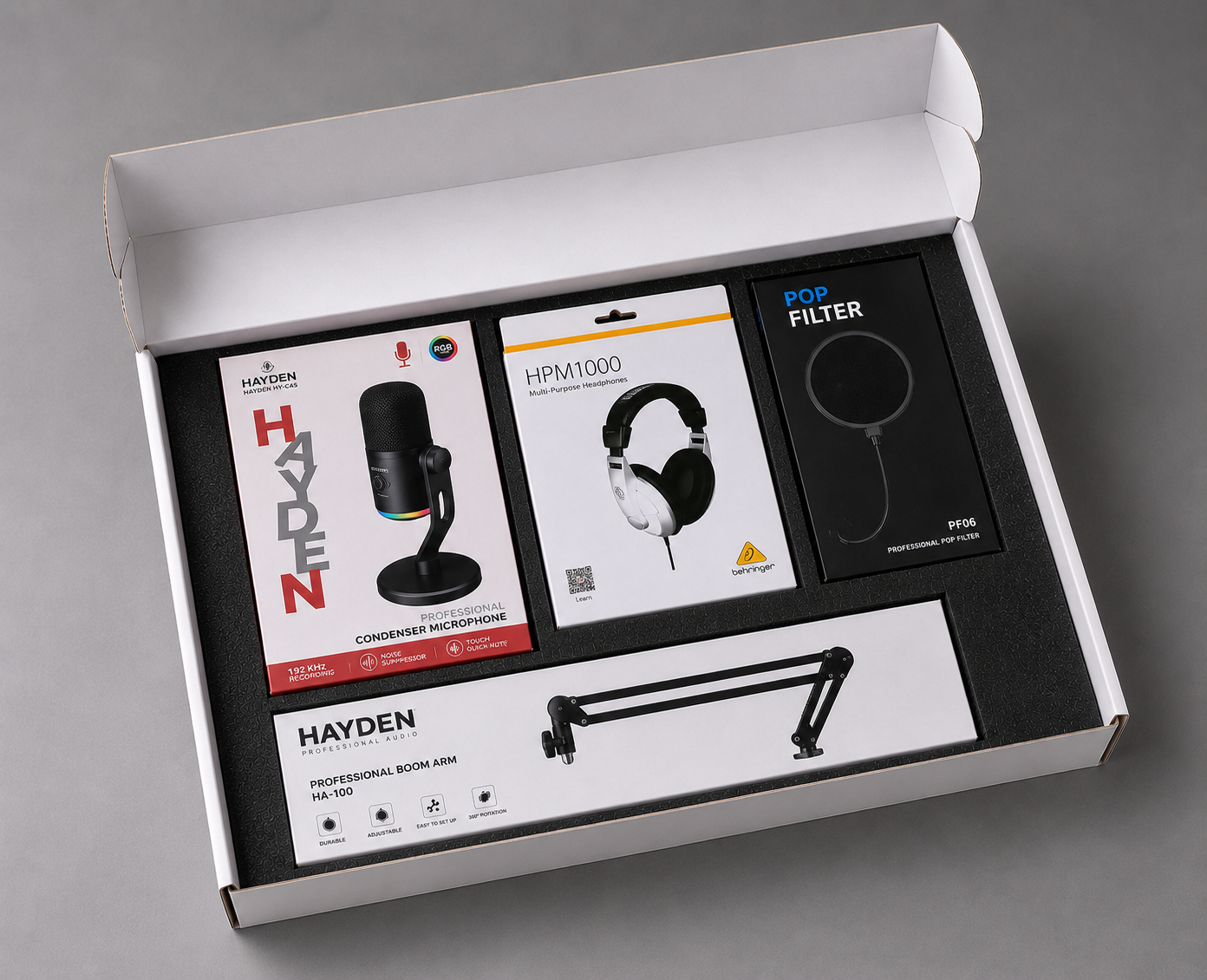 The complete Spark Bundle for Solo Podcasting setup inside its product packaging
